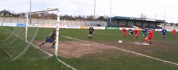 Damo strokes home the spot kick